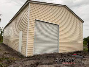 30'w x 50'd x 14'h Vertical Roof with Lap Siding with One 10'x10' Roll-Up Door