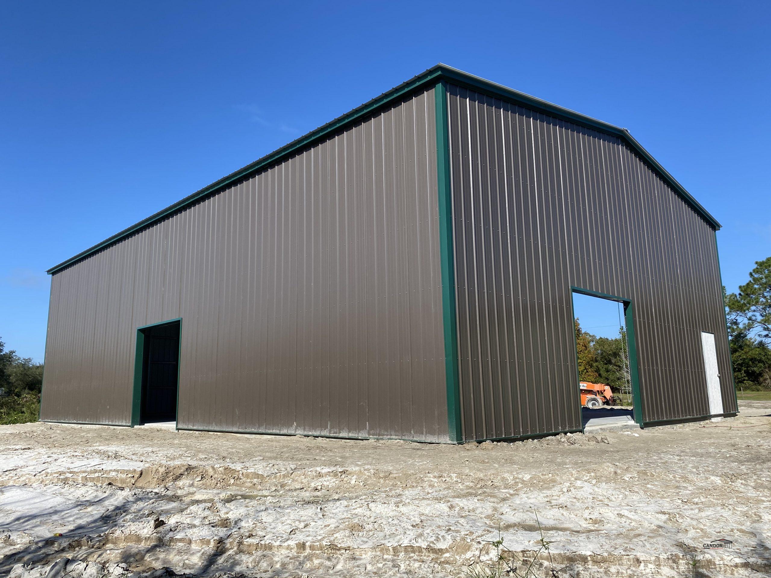 PHOTO 3 - 40'w x 60'd x 16'h Vertical Roof Vertical Sides Doors Open & Closed